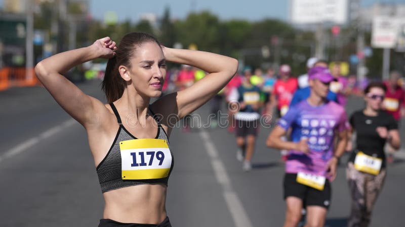 Maratona Campeã. Atleta Mulher Corredor. Competição Desportiva