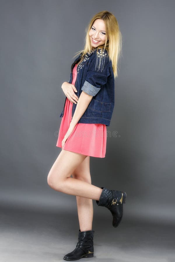 Full body portrait of attractive friendly smiling girl stock photo Full body portrait of attractive friendly smiling girl stock photo