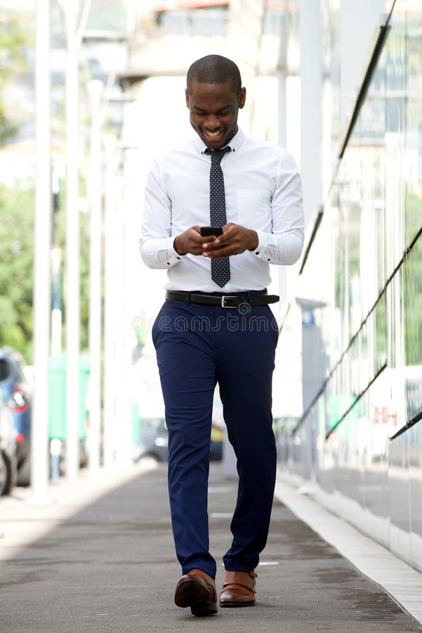 Full Body Smiling African American Businessman Walking with Mobile ...