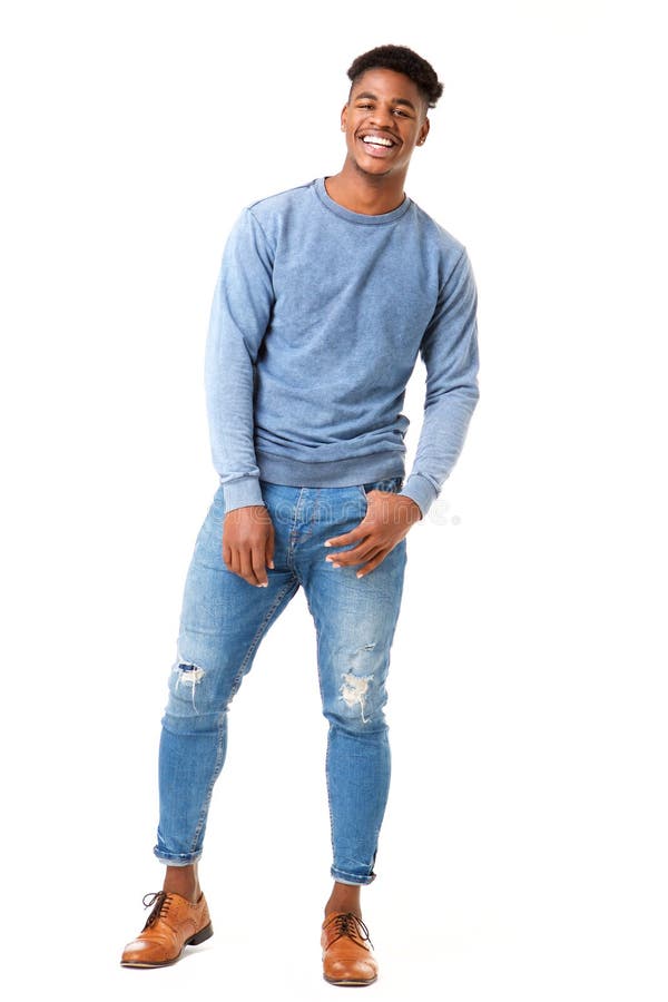 Full body smiling young black man standing against isolated white background