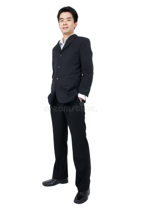 Full body of a smiling young Asian executive royalty free stock photography