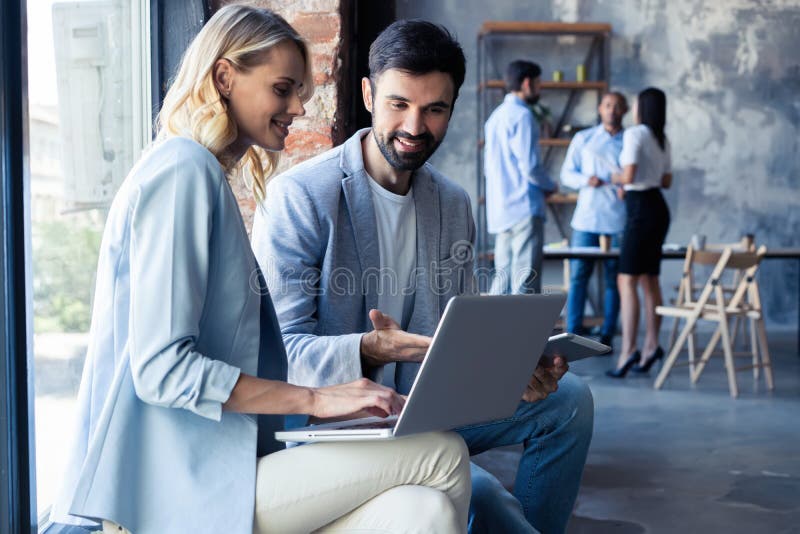 Full concentration at work. Corporate team working colleagues working in modern office. stock images