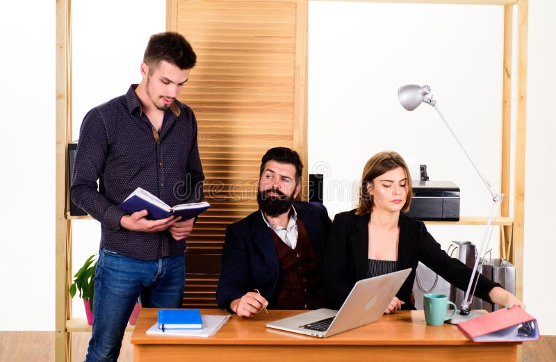 Full concentration at work. Professional people at work in office. Successful business men and woman using computer for royalty free stock images Full concentration at work. Professional people at work in office. Successful business men and woman using computer for royalty free stock images