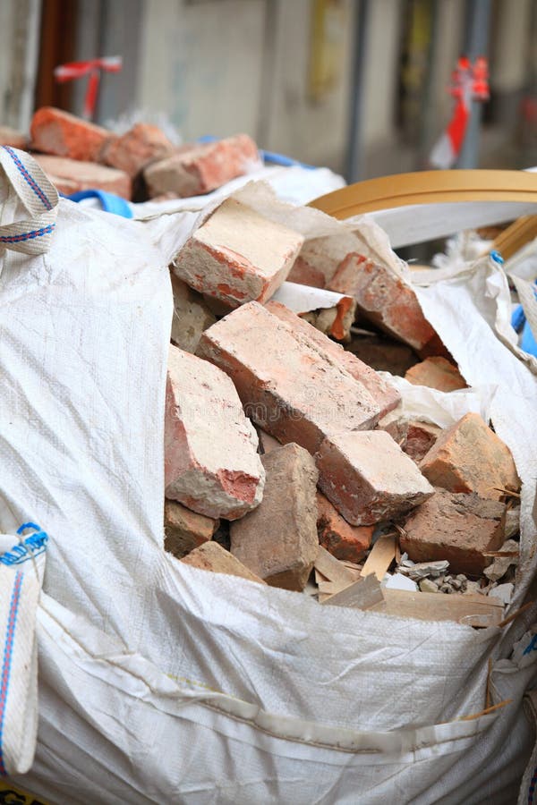 Construction waste debris bags, garbage bricks and material from Stock  Photo by ©alga38 57306407