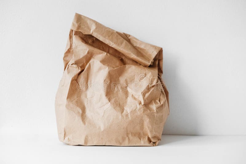 Empty shopping brown bag on transparent background