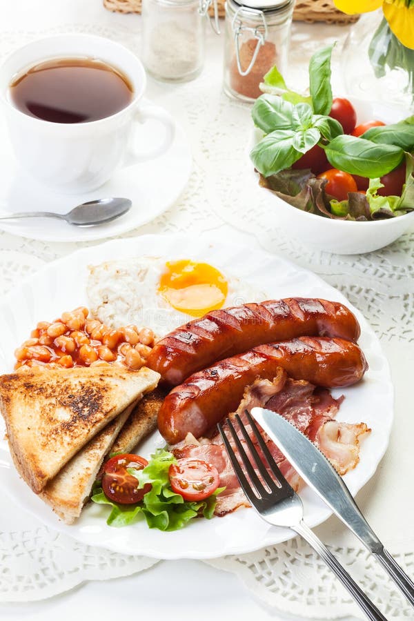 Full English Breakfast with Bacon, Sausage, Egg, Baked Beans and Stock