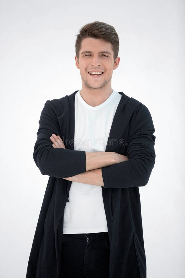 In full growth.portrait of a modern guy in a hoodie royalty free stock image In full growth.portrait of a modern guy in a hoodie royalty free stock image