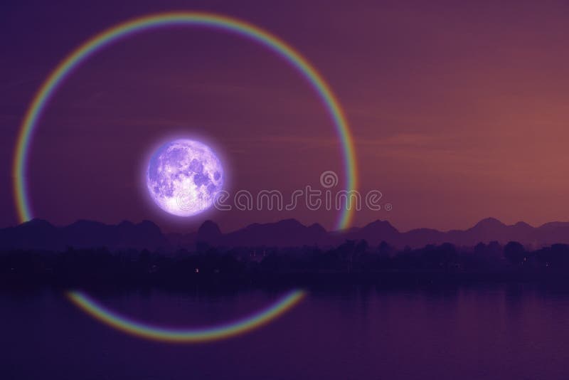 Full hay moon halo back silhouette mountain and river