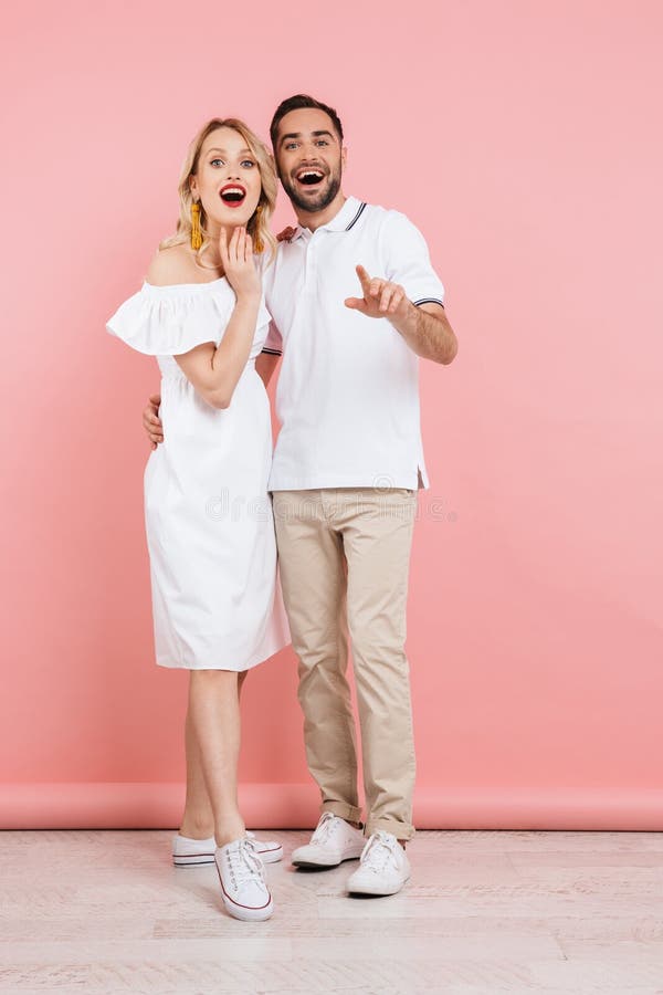 Full length of an attractive young couple standing together