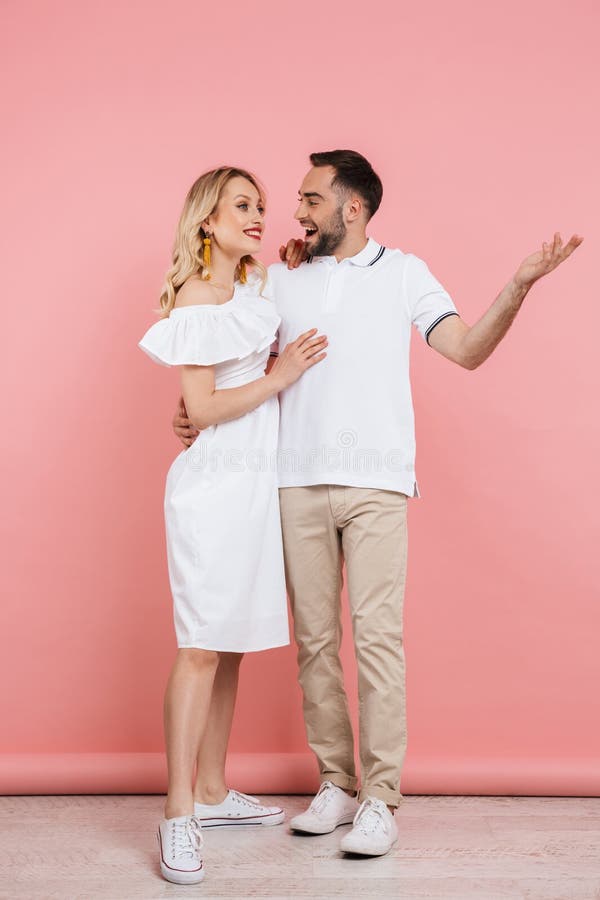 Full length of an attractive young couple standing together