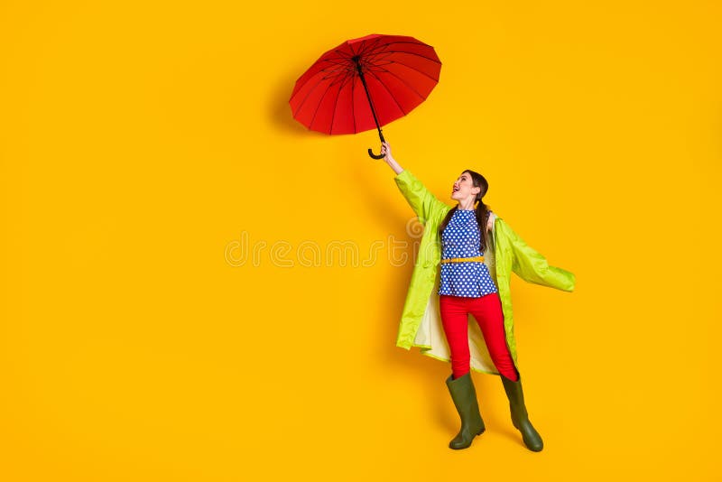 Full length body size view of her she nice attractive fashionable trendy cheerful cheery girl wearing green raincoat