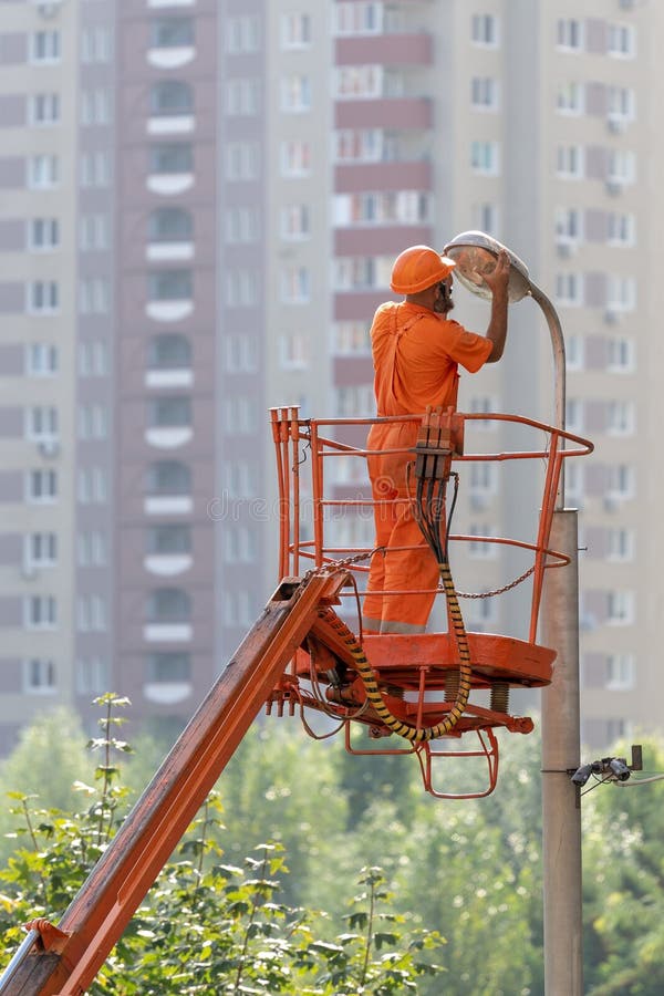 Full length, legs, body, size vertical portrait of repairman in