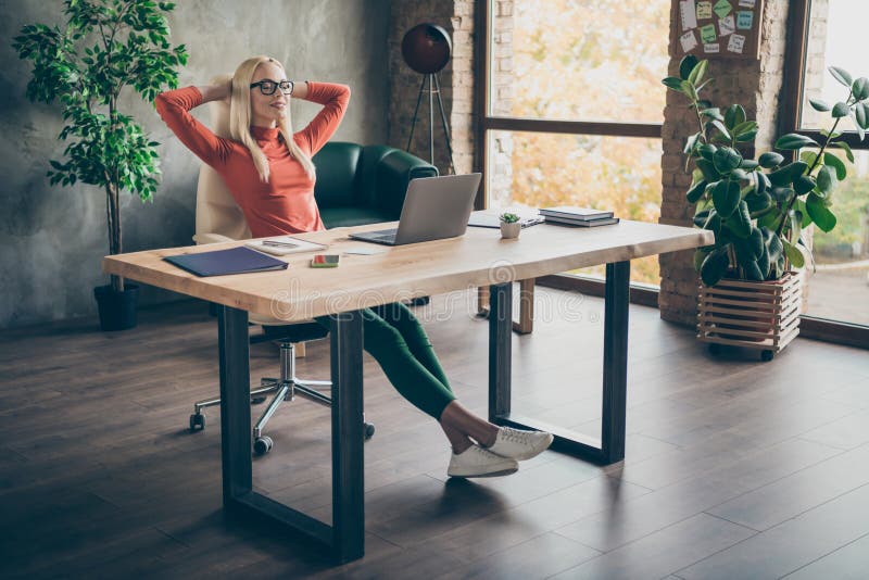 Free Photo  Businessman cheerful employee standing at yoga pose at office  on working table meditating after work