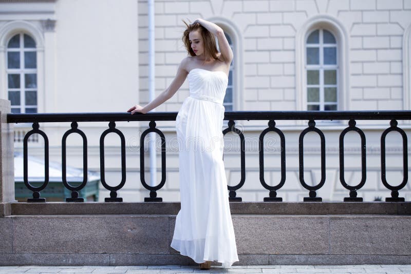 Full length portrait of beautiful model woman with long legs