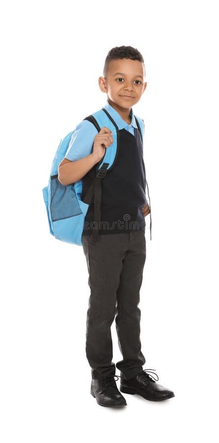 Full length portrait of cute African-American boy in school uniform with backpack on white stock photo Full length portrait of cute African-American boy in school uniform with backpack on white stock photo