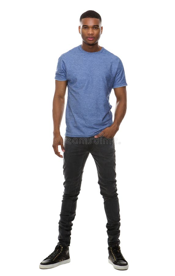 Full length portrait of a fashionable young man standing on isolated white background