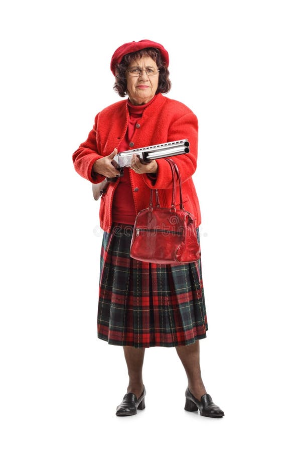 Grumpy senior woman with a shotgun stock photos Grumpy senior woman with a shotgun stock photos