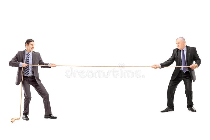 Full length portrait of two businessmen pulling a rope royalty free stock images
