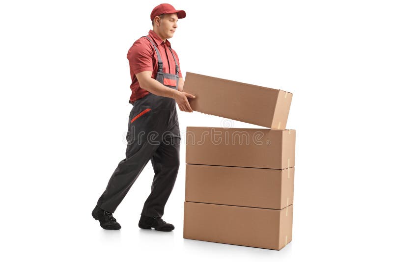 Full Length Profile Shot Of A Mover Placing A Package On Top Of