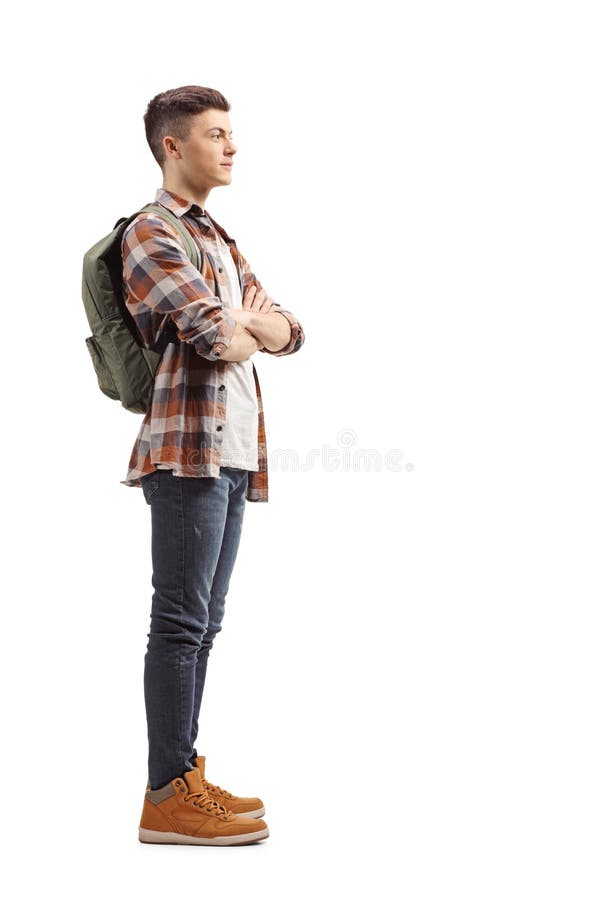 Full length profile shot of a teenage male student standing and royalty free stock images Full length profile shot of a teenage male student standing and royalty free stock images