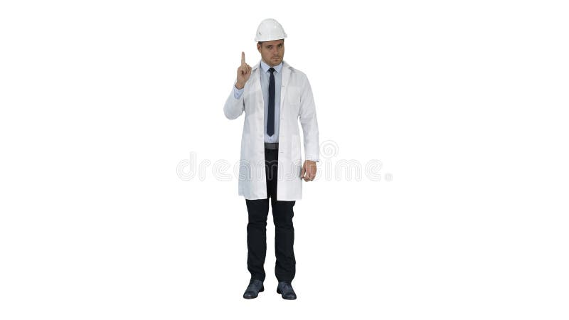 Science engineer in helmet showing stop sing and then makes an attention gesture on white background. stock image