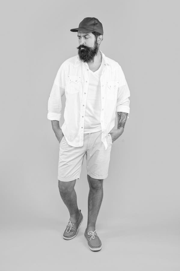 Full length of stylish caucasian man isolated on yellow. stylish caucasian man in studio. royalty free stock photos