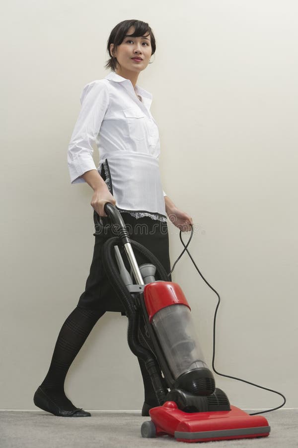 Full Length of Young Female Housekeeper Vacuuming Stock Image Image