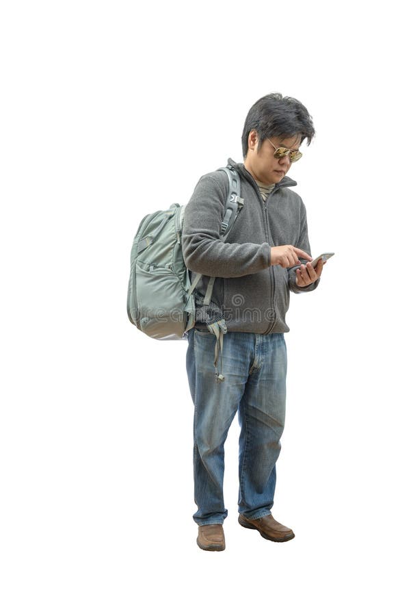 Full length of young traveler using smartphone stock images