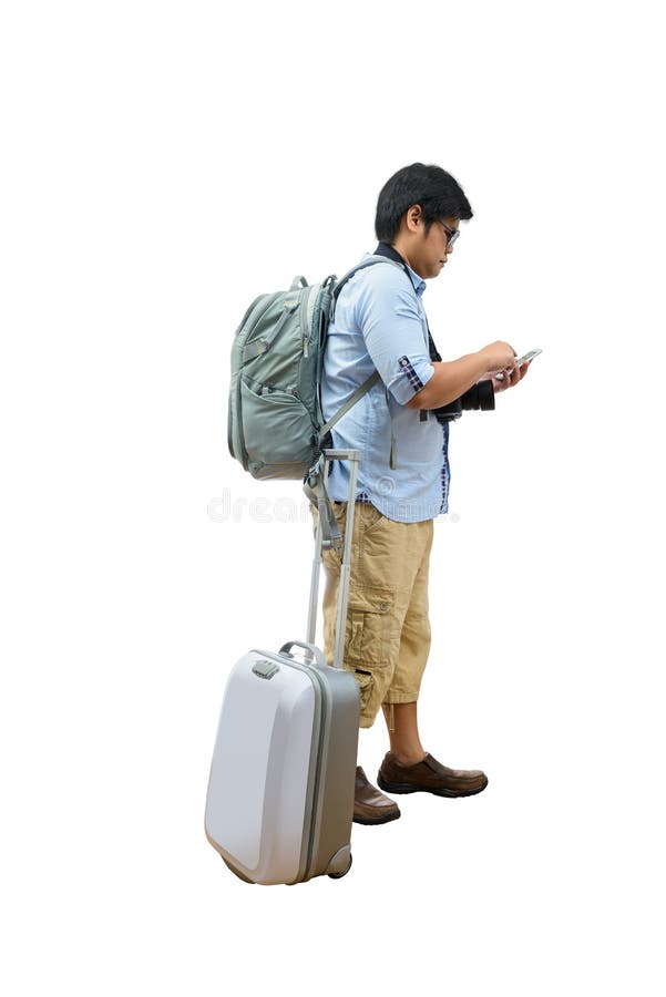 Full length of young traveler using smartphone royalty free stock photos