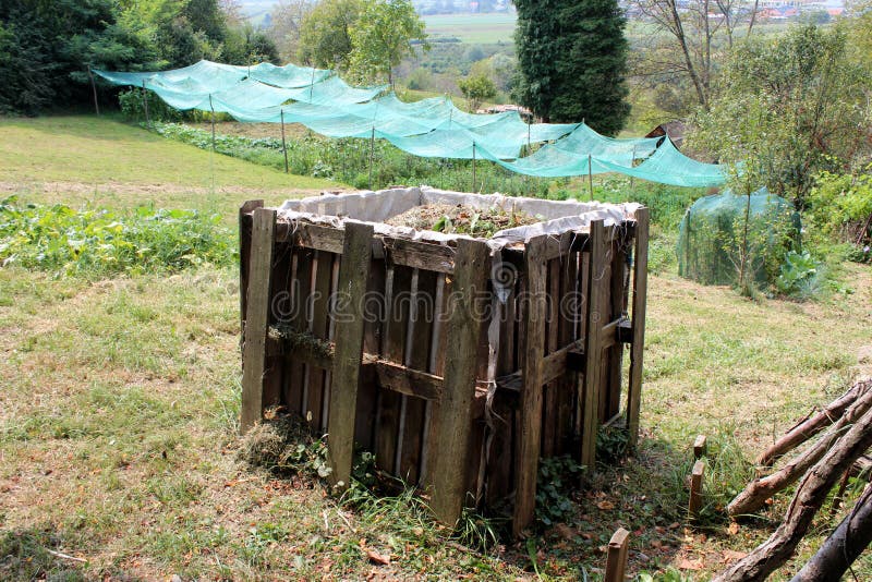 Full Makeshift Outdoor Homemade Wooden Compost Box Made of Wooden Pallets Surrounded with Grass and Plants in Local Urban Garden Stock Photo - Image of plants, makeshift: 159747176 Full Makeshift Outdoor Homemade Wooden Compost Box Made Of Wooden Pallets Surrounded With Grass And Plants In Local Urban Garden Stock Photo - Image Of Plants, Makeshift: 159747176