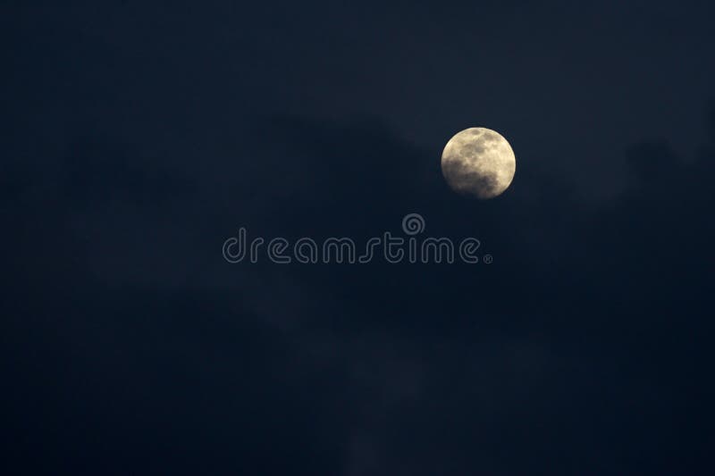 Full moon obscured by clouds royalty free stock image