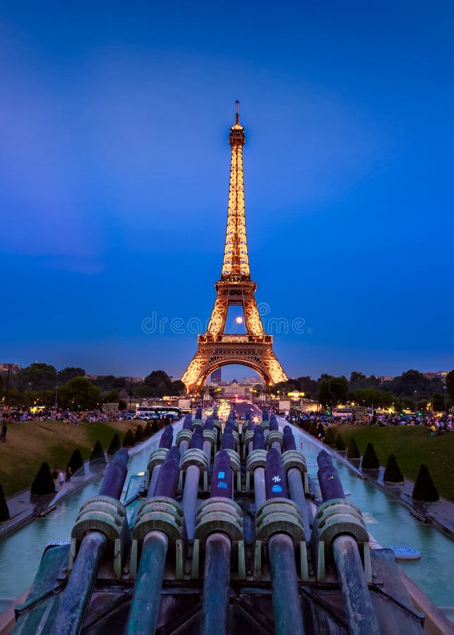 Moon peeping through eiffel tower