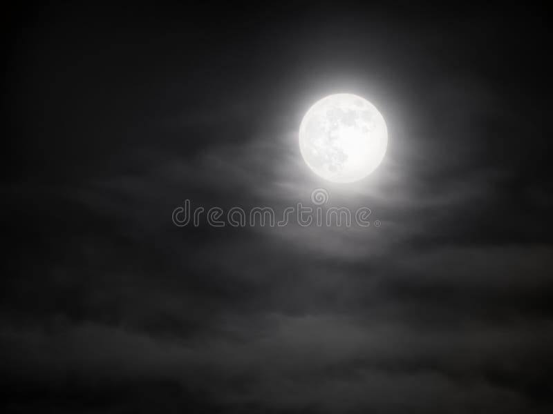 Beautiful clouds lit up by the bright full moon stock images Beautiful clouds lit up by the bright full moon stock images