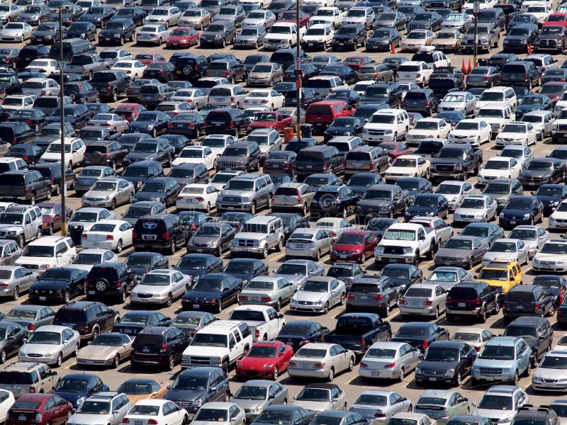 Full Parking lot of cars, trucks, suv, and vans during baseball game