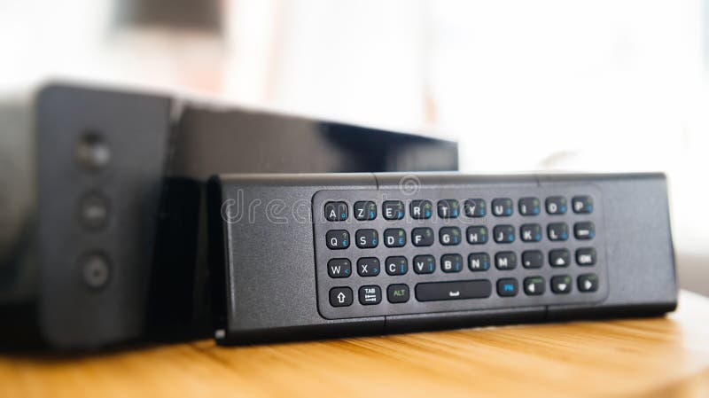 Full Qwerty Keyboard Next To Internet Tv Box Stock Photo - Image of