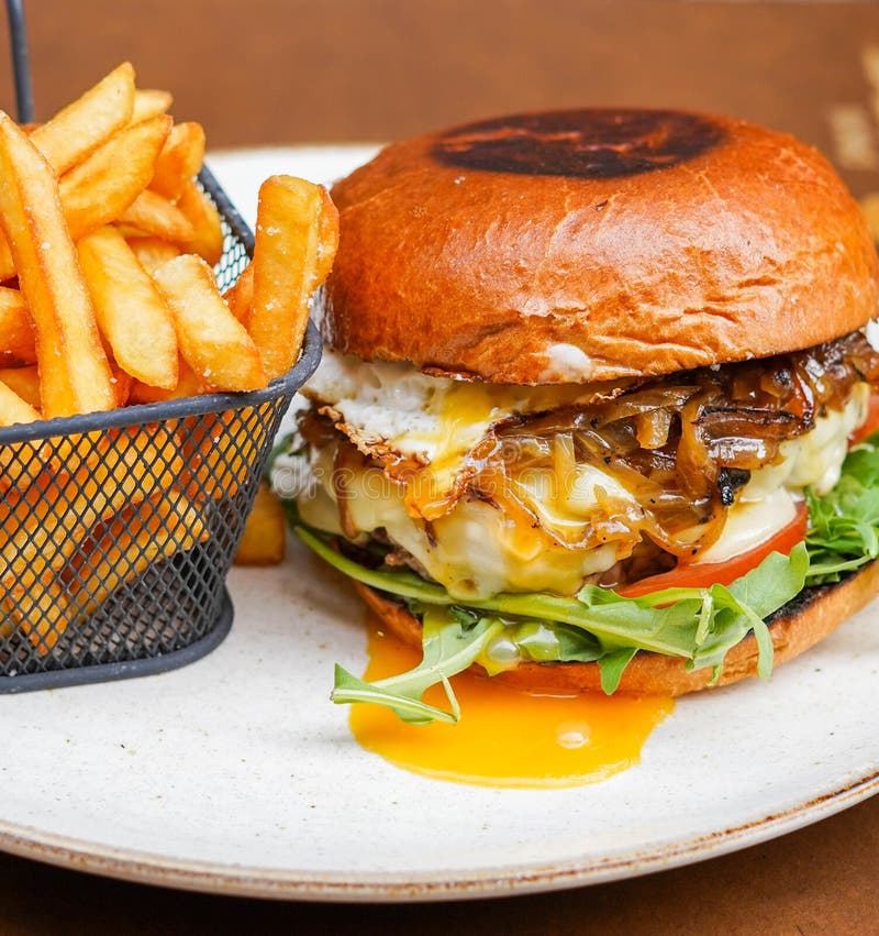 Full Rustic Beef Burger with Fries and Fried Egg Stock Photo Image of