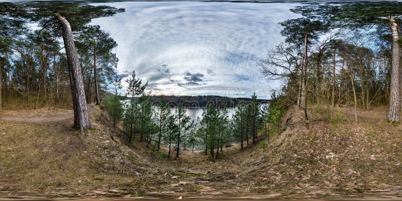 Full seamless spherical panorama 360 degrees angle view on high bank of wide river neman in evening with beautiful clouds in royalty free stock image Full seamless spherical panorama 360 degrees angle view on high bank of wide river neman in evening with beautiful clouds in royalty free stock image