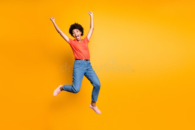 Full size photo of crazy funny funky girl jump raise her fists scream yeah celebrate victory lottery wear red t-shirt