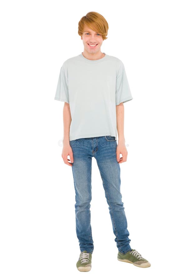 Full teenage boy standing stock photo. Image of jeans - 26074868