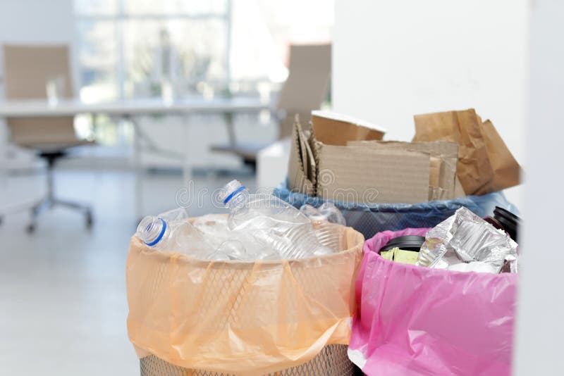 Full Trash Cans in Modern Office. Waste Recycling Stock Photo Image