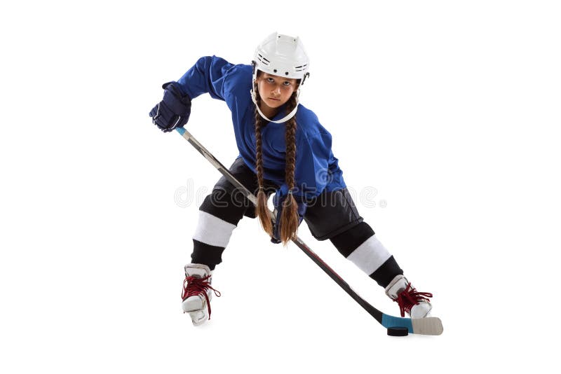 Fulllength porträtt av en liten hockeyspelare isolerad över svart bakgrund royaltyfri fotografi