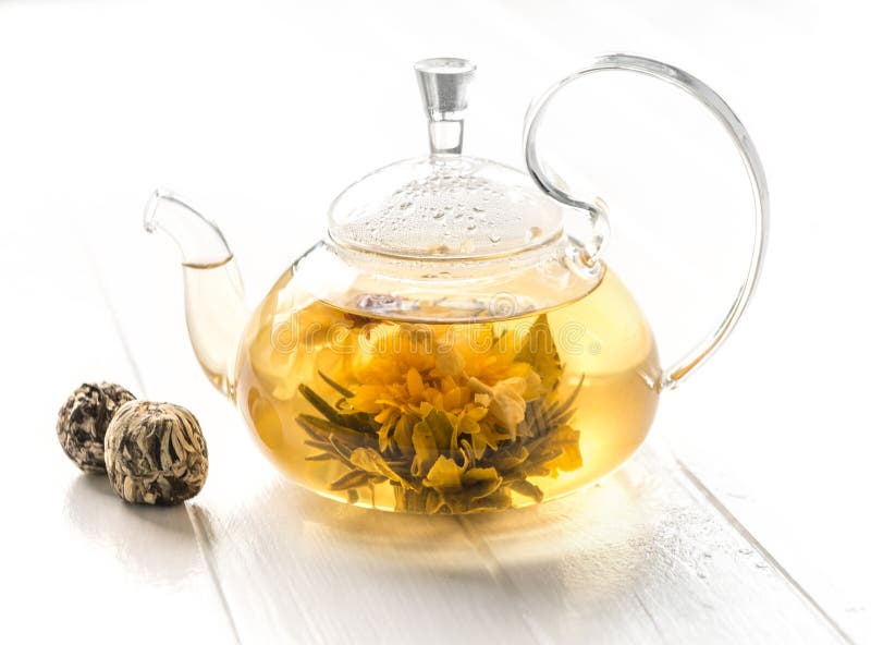 Fully brewed blossoming tea in a pot stock photo Fully brewed blossoming tea in a pot stock photo