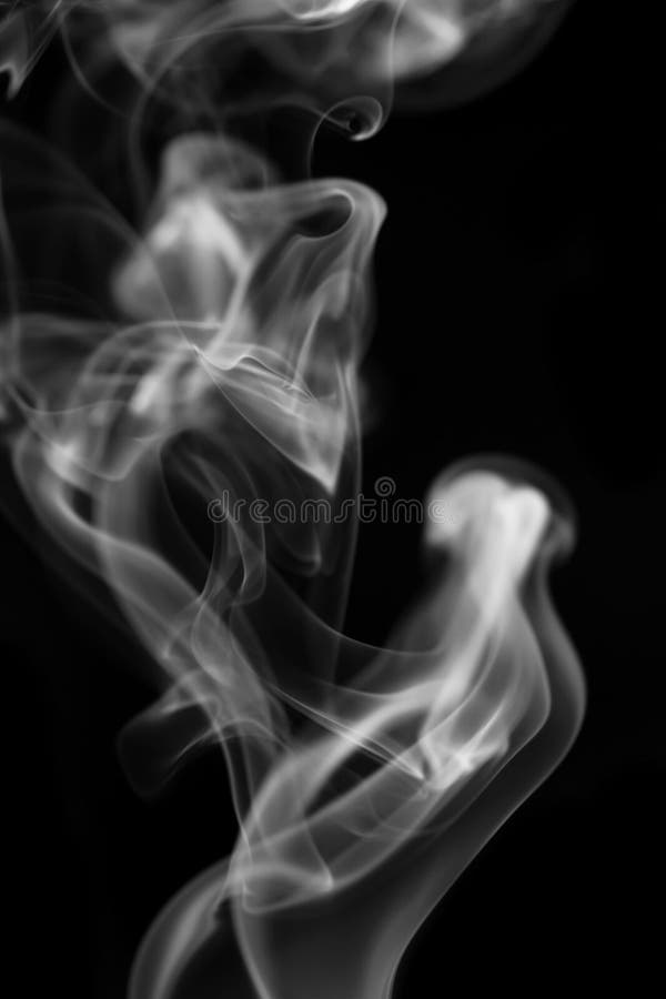 Fumée sur le fond noir Macro photographie stock libre de droits