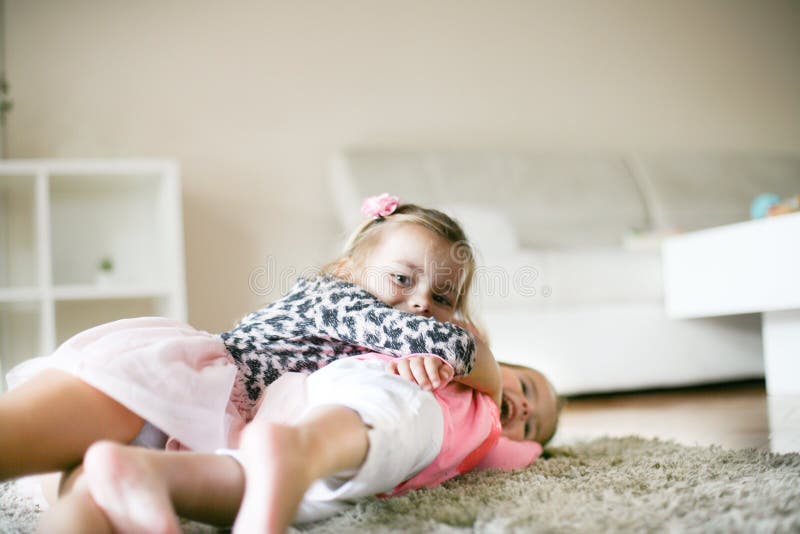 Girl playing with girl