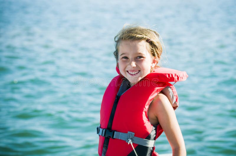 Fun at the Lake Girl with Lifejacket Stock Image Image of sunny