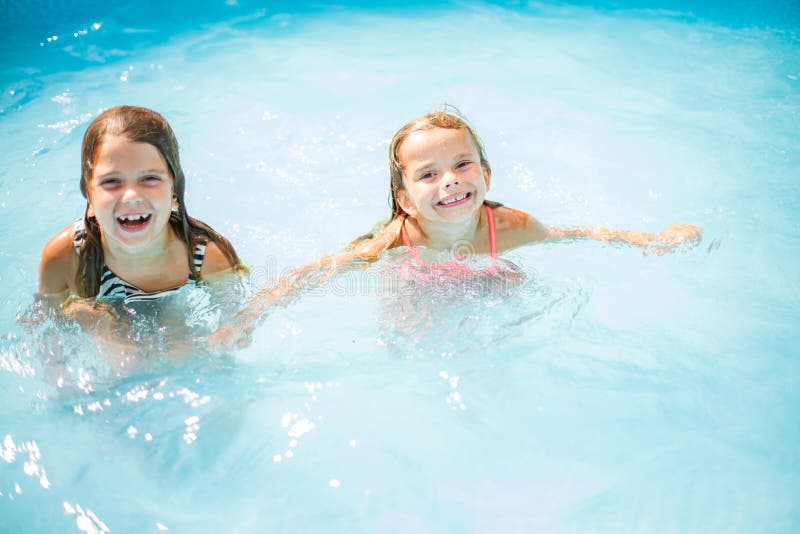 Little Girl Playing in Pool. Stock Image Image of childhood, aquatic