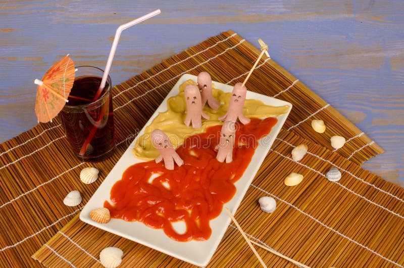 Fun sausages in the beach stock photo. Image of portion 37643036