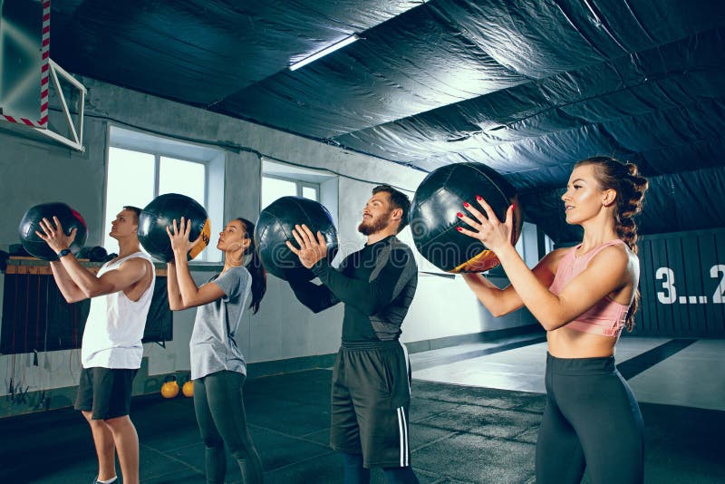 Functional fitness workout at the gym with medicine ball