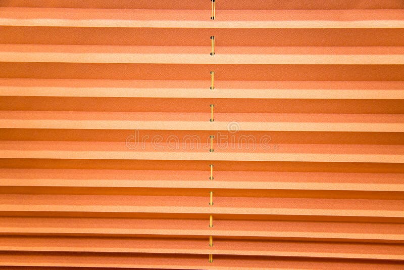 Fundalul constă din benzi orizontale portocalii și galbene cu un tipar abstract. proiectare texturi fundaluri royalty free stock photography