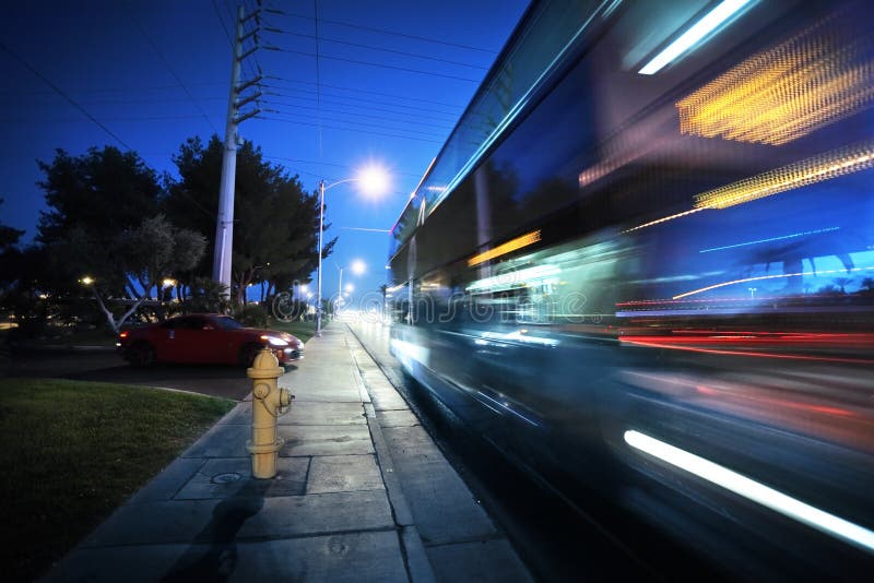 Speeding bus, blurred motion. Dynamic background. Speeding bus, blurred motion. Dynamic background.
